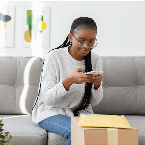 Colis reçu — confirmation sur téléphone à domicile